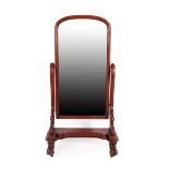 A Victorian Carved Mahogany Cheval Mirror, circa 1870, the original mirror plate within a pivoting