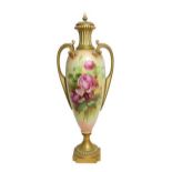 A Royal Worcester Porcelain Vase and Cover, by Frank Roberts, 1909, of slender baluster form with