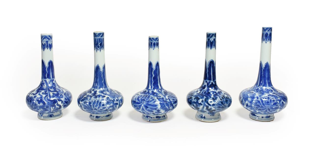 A Matched Garniture of Five Chinese Porcelain Bottle Vases, Kangxi, painted in underglaze blue