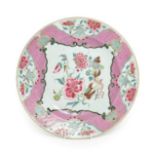 A Chinese Porcelain Charger, Qianlong, painted in famille rose enamels with a spray of flowers in
