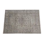Kashan Carpet Central Iran, circa 1970 The pale celadon field of scrolling vines around a