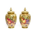 A Pair of Royal Worcester Porcelain Vases and Covers, by John Freeman, 2nd half 20th century, of
