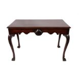 A George III Irish Carved Mahogany Serving Table, late 18th century, the moulded top above a