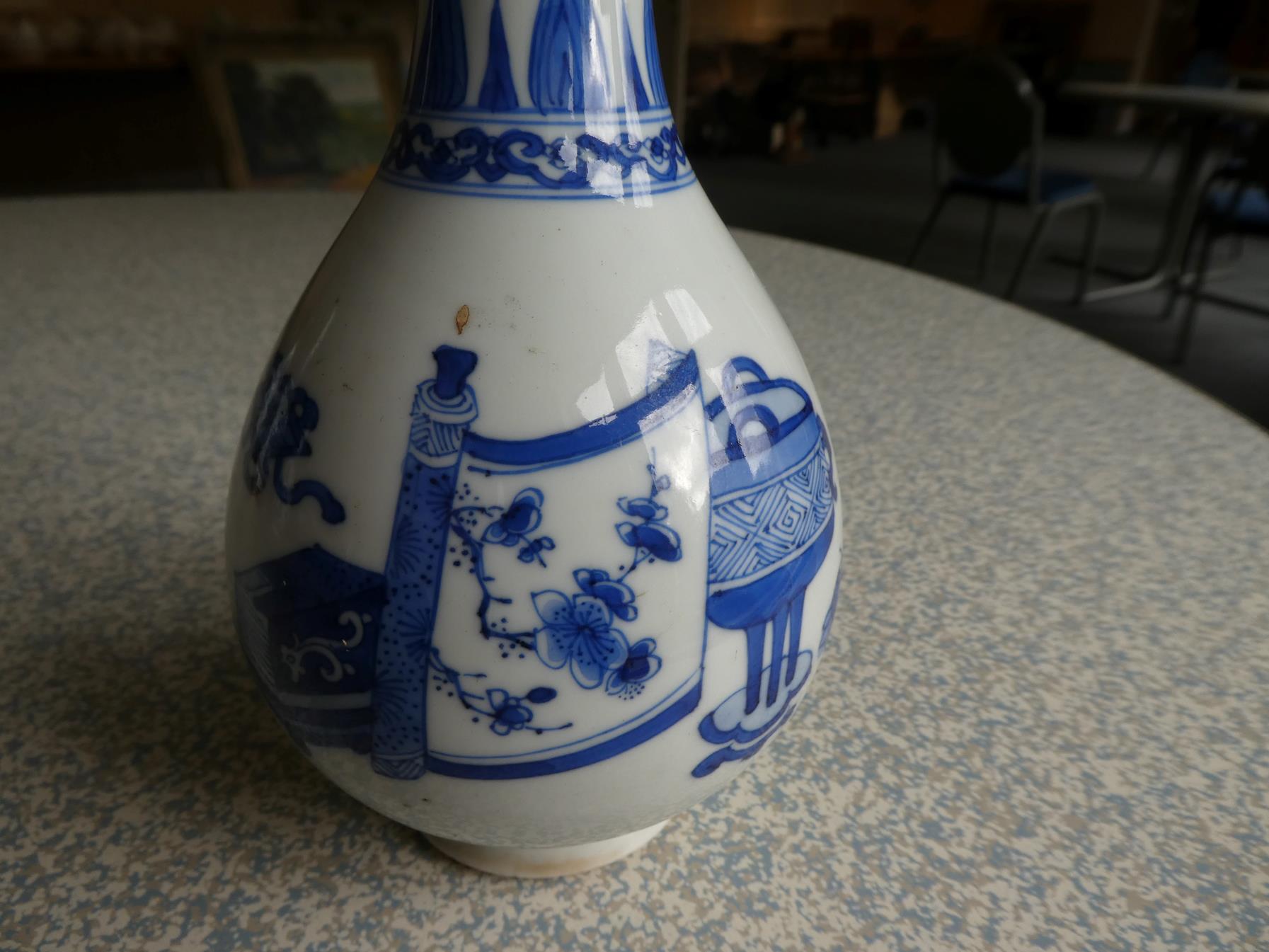 A Pair of Chinese Porcelain Bottle Vases, Kangxi, painted in underglaze blue with scrolls and - Image 5 of 33