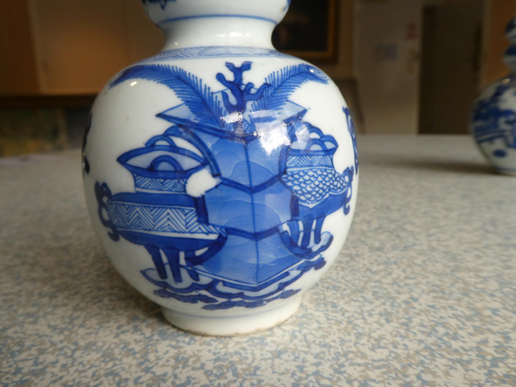 A Matched Pair of Chinese Porcelain Double Gourd Vases, Kangxi, with trumpet necks, painted in - Image 17 of 31