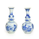 A Matched Pair of Chinese Porcelain Double Gourd Vases, Kangxi, with trumpet necks, painted in