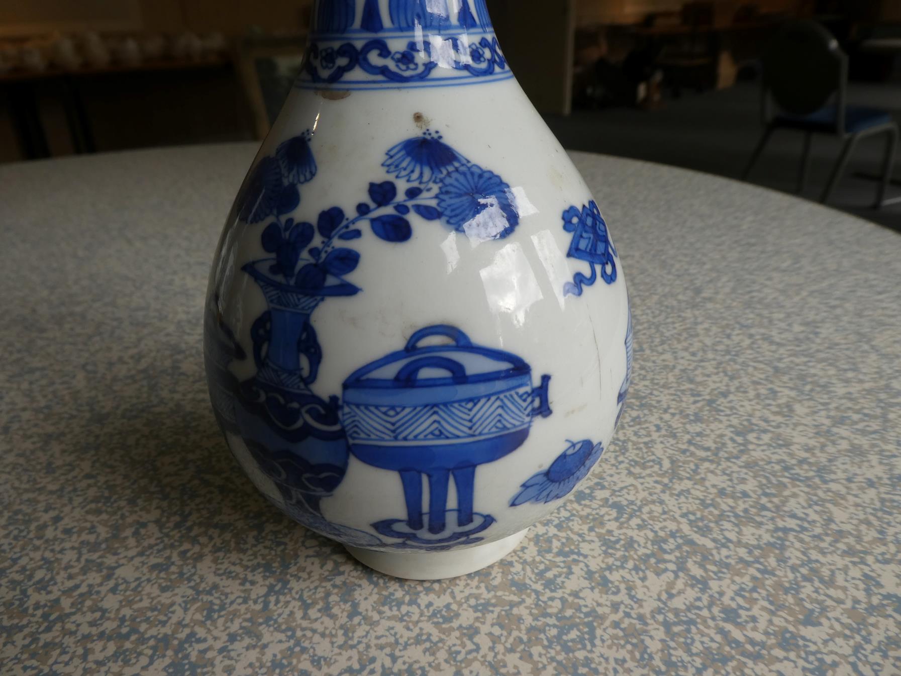 A Pair of Chinese Porcelain Bottle Vases, Kangxi, painted in underglaze blue with scrolls and - Image 3 of 33