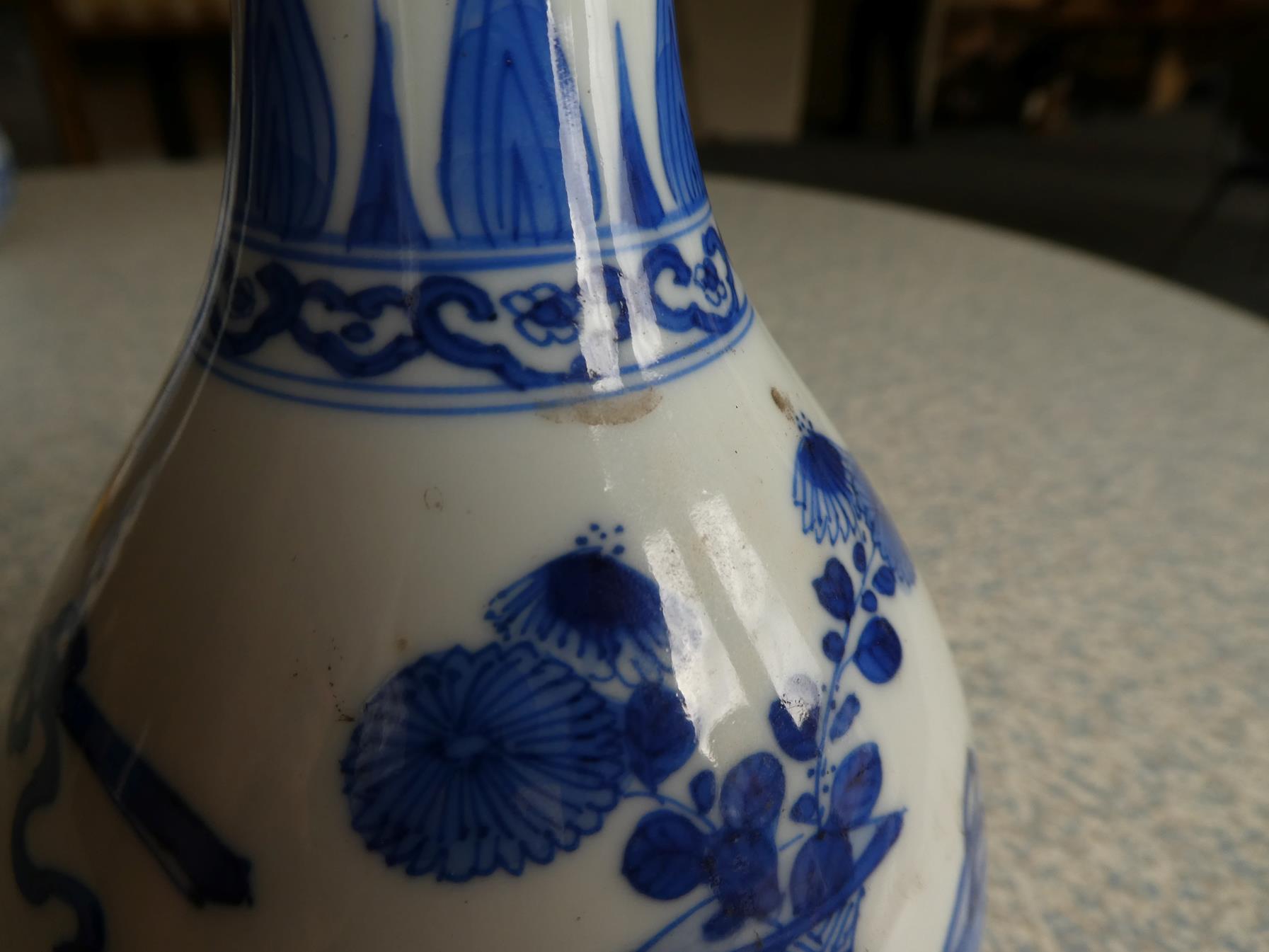 A Pair of Chinese Porcelain Bottle Vases, Kangxi, painted in underglaze blue with scrolls and - Image 7 of 33