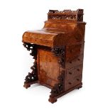 Maple & Co, London: A Fine Victorian Burr Walnut Piano-Top Davenport, circa 1870, the sprung