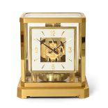 A Brass Atmos Clock, signed Jaeger LeCoultre, 20th century, case with glazed panels, base with