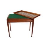 A Late 19th Century Oak Gaming Table, with removable cover, the verso with two gaming boards above a