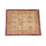 Good Ushak Design Rug Anatolia, modern The cream field of large flower heads enclosed by