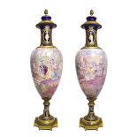 A Pair of Gilt Metal Mounted Sèvres Style Earthenware Vases and Covers, circa 1900, of baluster