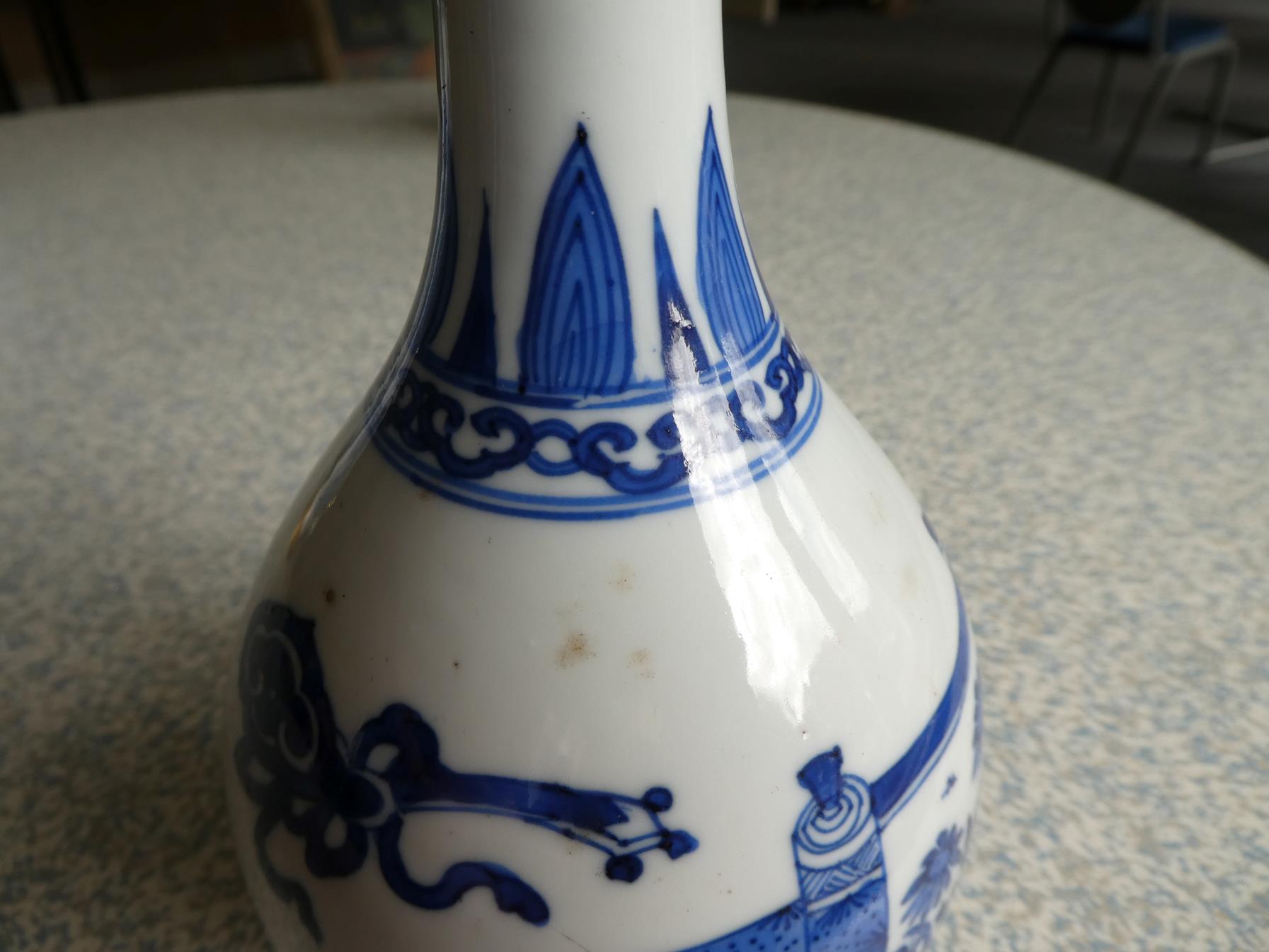 A Pair of Chinese Porcelain Bottle Vases, Kangxi, painted in underglaze blue with scrolls and - Image 23 of 33