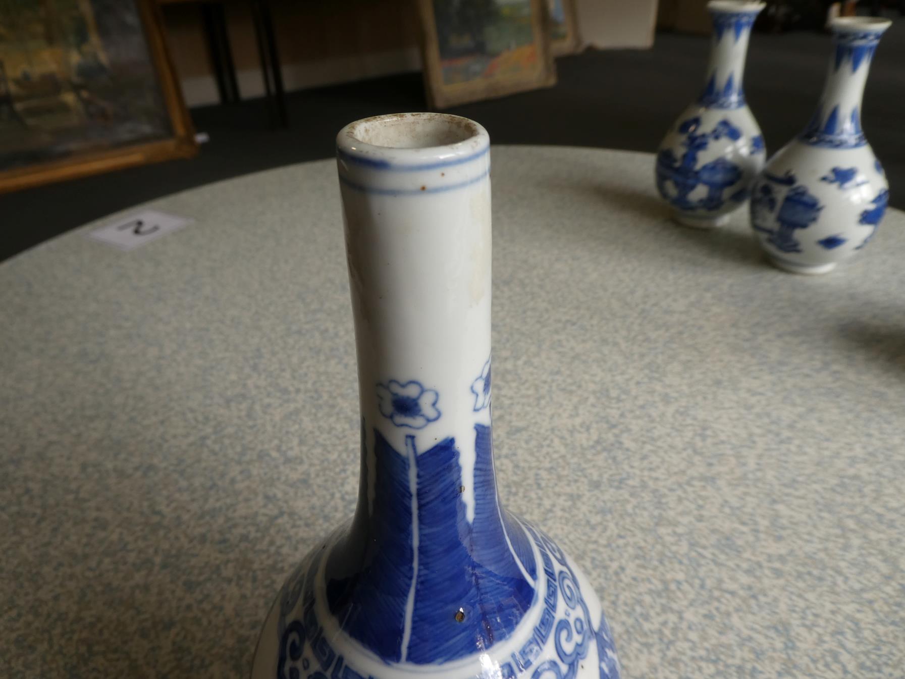 A Gilt Metal Mounted Chinese Porcelain Bottle Vase, the porcelain Kangxi, painted in underglaze blue - Image 9 of 15