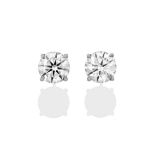 A Pair of Diamond Solitaire Earrings, the round brilliant cut diamonds in white four claw