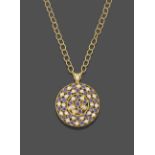 A Diamond and Alexandrite Pendant, by Mark Henry, the circular medallion set throughout with round