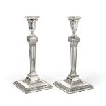 A Pair of George III Silver Candlesticks, Possibly by Joseph Steward, London, 1781, each on square