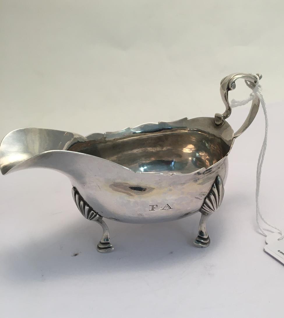 A George III Silver Cream-Boat, by John Langlands, Newcastle, Circa 1800, boat-shaped and on three - Image 2 of 4