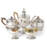 An Assembled George III Silver Tea-Service, each piece oval and with part-fluted lower body,