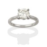 A Platinum Diamond Solitaire Ring, the round brilliant cut diamond in a four claw setting, estimated