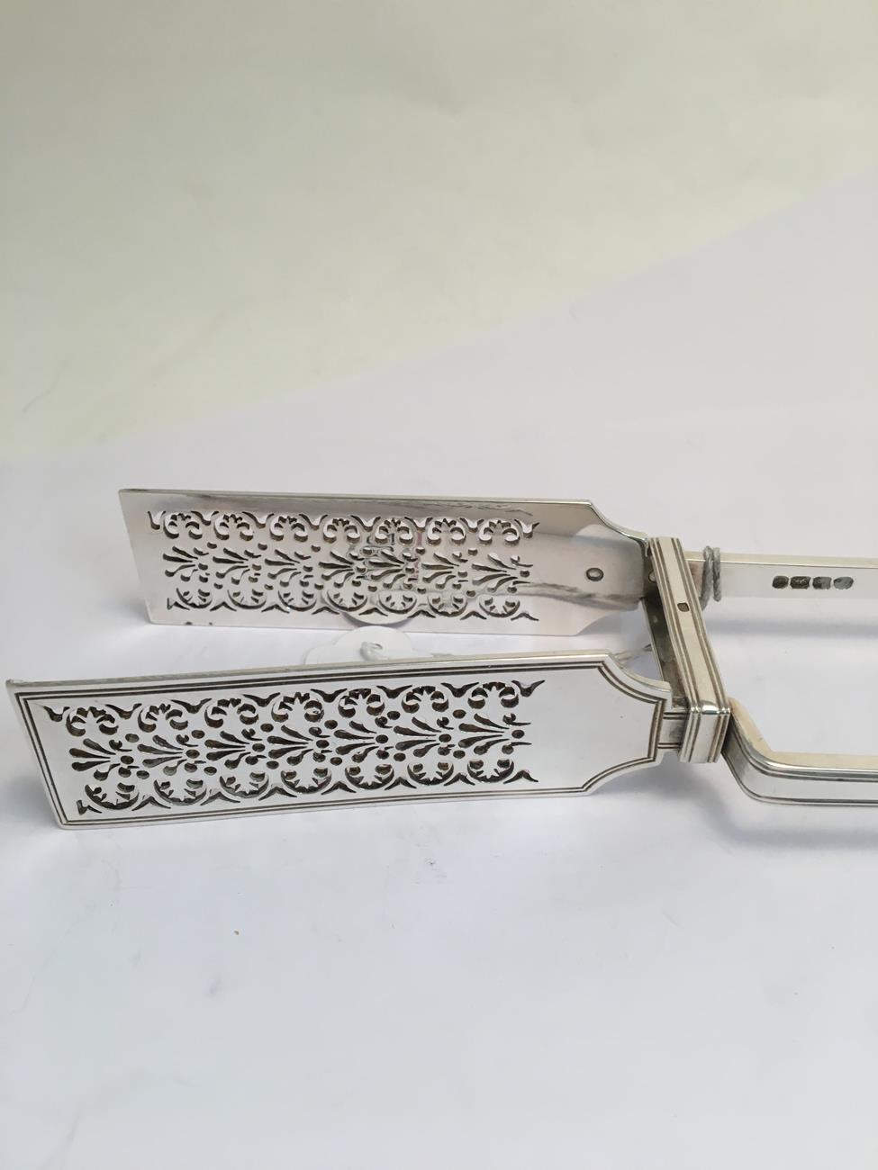 A Pair of George IV Silver Asparagus-Tongs, by William Eaton, London, 1828, Queen's pattern, - Image 6 of 6