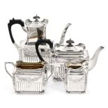 A Four-Piece Victorian Silver Tea and Coffee-Service, by Elkington and Co., Birmingham, The Coffee-