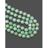 A Jade Bead Necklace, one hundred and eight uniform spherical beads knotted as a continuous