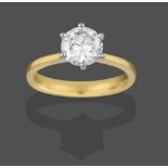 An 18 Carat Gold Diamond Solitaire Ring, the round brilliant cut diamond in a white claw setting, to