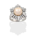 A Pearl and Diamond Cluster Ring, the central button pearl within an undulating border of eight-