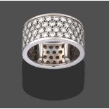 A Diamond Eternity Ring, by Picchiotti, four rows of round brilliant cut diamonds in white pavé