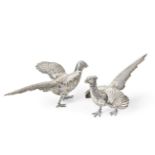 A Pair of German Silver Game Bird Ornaments, First Half 20th Century, realistically modelled as a