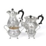 A Three-Piece Edward VII Silver Tea-Service and an Edward VIII Silver Hot-Water Jug to Match, The