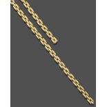 A Fancy Link Necklace and Bracelet 'Gentiane' Suite, by Cartier, formed of three rows of yellow