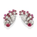A Pair of Diamond and Ruby Ear Clips circa 1925, of stylised fan motifs with floral terminals, set