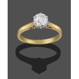 An 18 Carat Gold Diamond Solitaire Ring, the old cut diamond in a white claw setting, to a