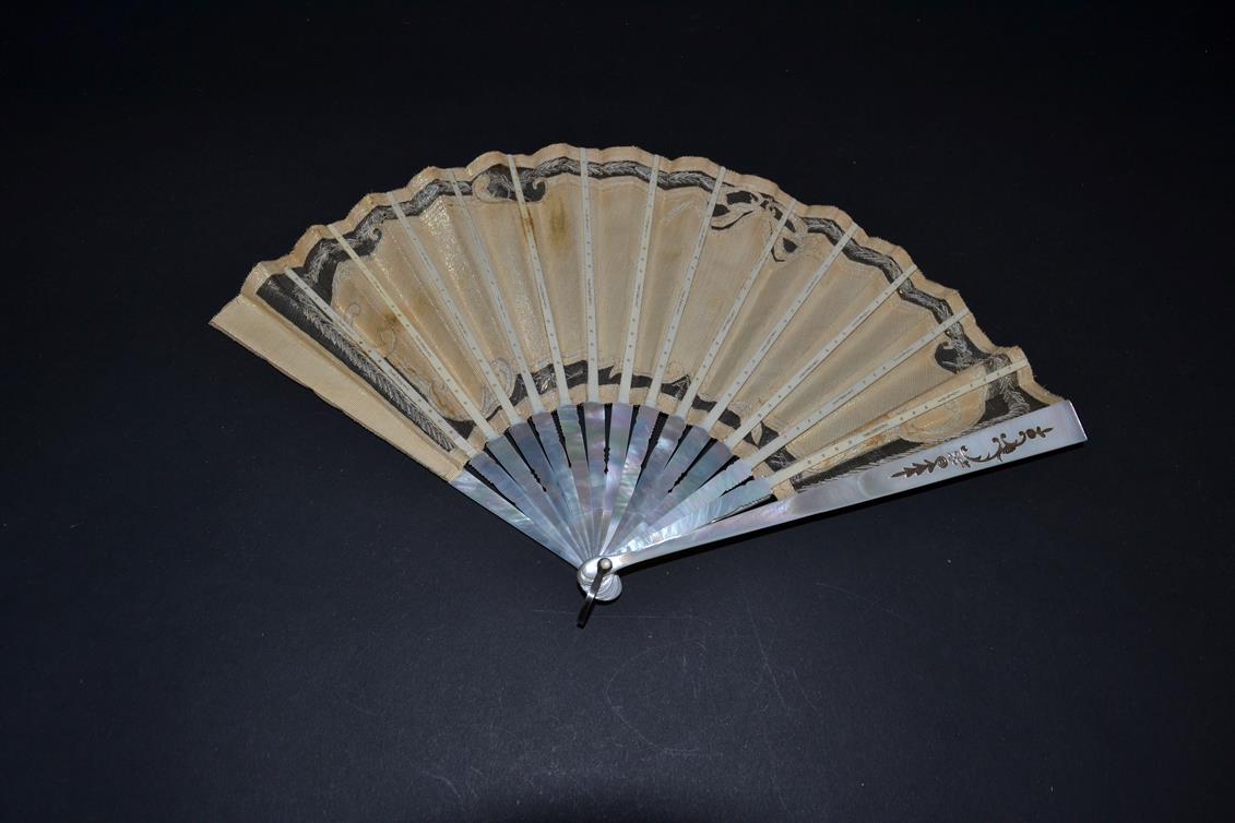 An Early 20th Century White Mother-of-Pearl Fan, the leaf with cream background net, overlaid with - Image 2 of 2