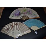 An Attractive, Large 1890's Cream Gauze Fan painted with branches of lilac blossom in shades of