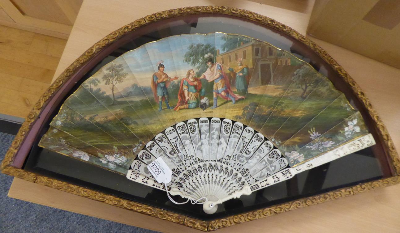 An 18th Century Ivory Fan, the skin leaf mounted à l'Anglaise and painted with a scene of a son - Image 3 of 8