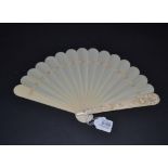 A Circa 1880's European Carved Ivory Brisé Fan, the fourteen inner sticks and lower guard plain, the