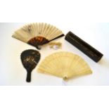 An Early 20th Century Chinese Fan, the sticks and ribs of tortoiseshell, the cream gauze leaf