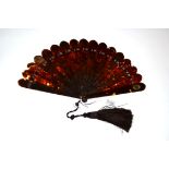 An Elegant Circa 1880's Tortoiseshell Brisé Fan, with good mottling, the fifteen inner sticks and