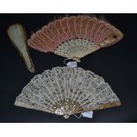 A Circa 1920's Pink Mother-of-Pearl Fan, the monture gilded, mounted with a Brussels tape lace leaf,