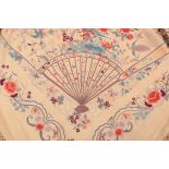 A Chinese Canton Silk Piano Shawl, circa 1900, in buttermilk silk, embroidered to each corner with a
