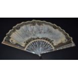 An Early 20th Century White Mother-of-Pearl Fan, the leaf with cream background net, overlaid with