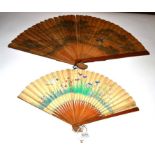 Japan, 19th Century, A Large Wood Brisé Fan painted to the recto with a distant view of Mount