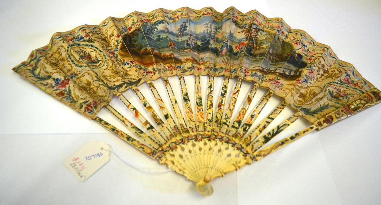 A Mid-18th Century Ivory Fan, the monture carved, pierced and painted in strong colours, to match