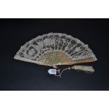 Cupid Awaits! A Late 19th Century Mixed Brussels Lace Fan, a needlepoint feature to the left showing