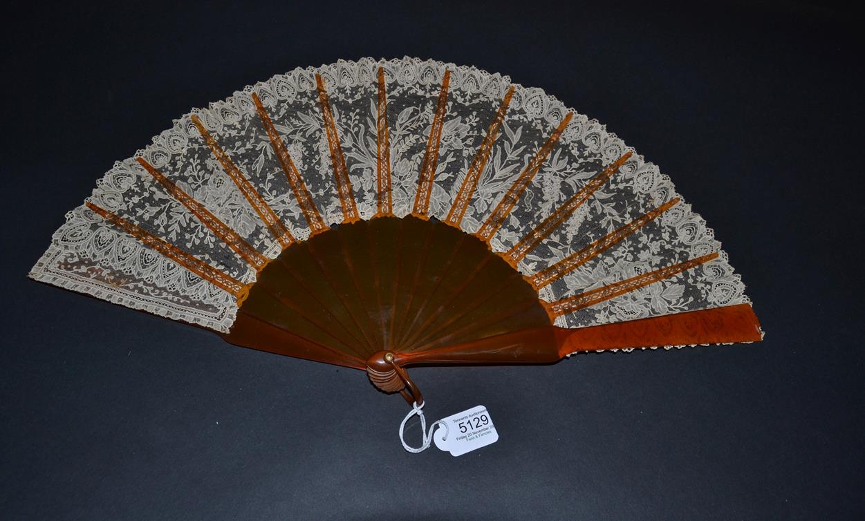 A Late 19th Century Brussels Lace Fan, the Point de Gaze needle lace leaf mounted on resin or '' - Image 2 of 2