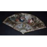 An 18th Century Ivory Fan, the slender monture carved, pierced and painted in colour, the gorge with